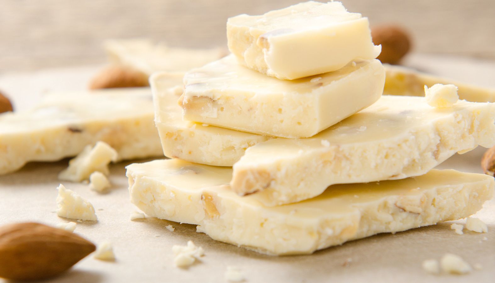 White chocolate pieces stacked on top of one another - wine and chocolate