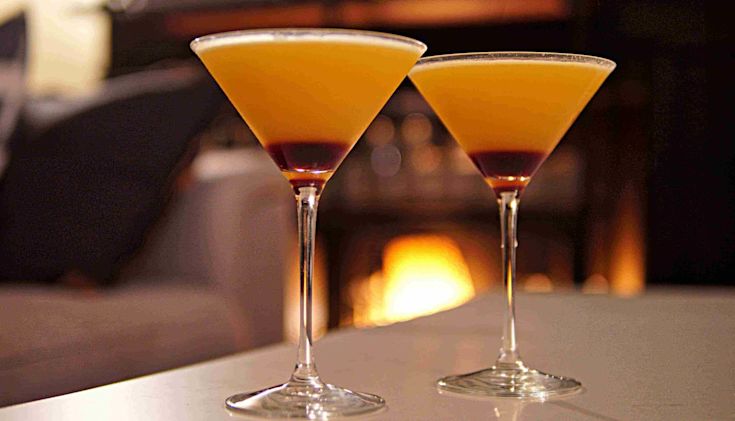 Two Old Cuban cocktails on a table