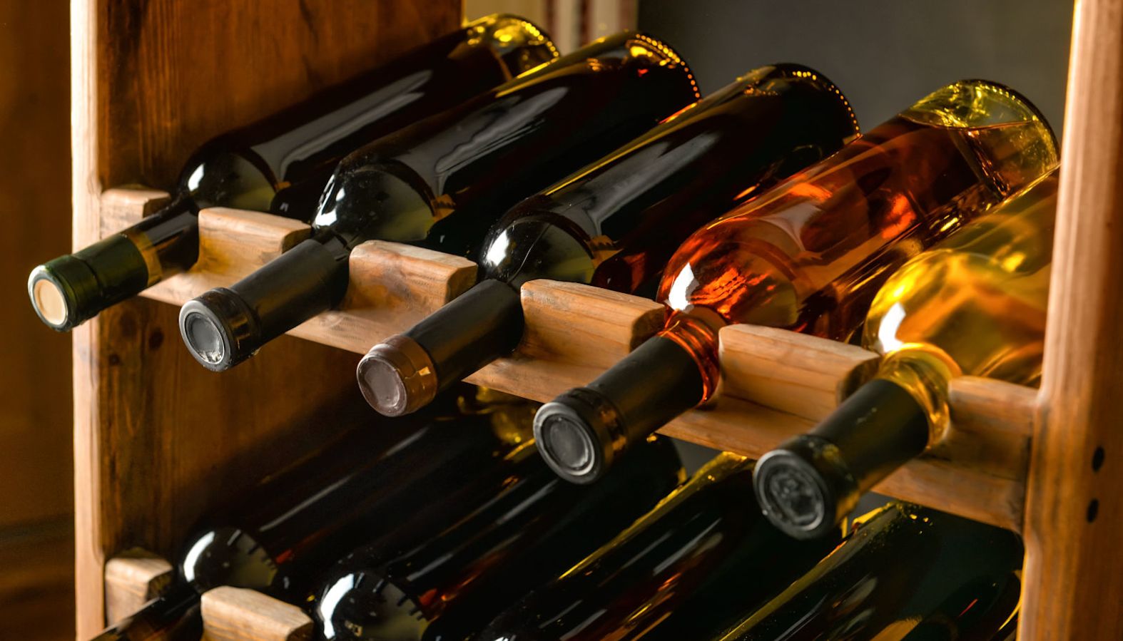 A selection of wine bottles on a wine rack - wine ratings