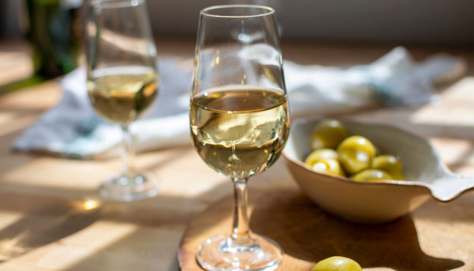 Glasses of Sherry enjoyed with olives - Sherry wine