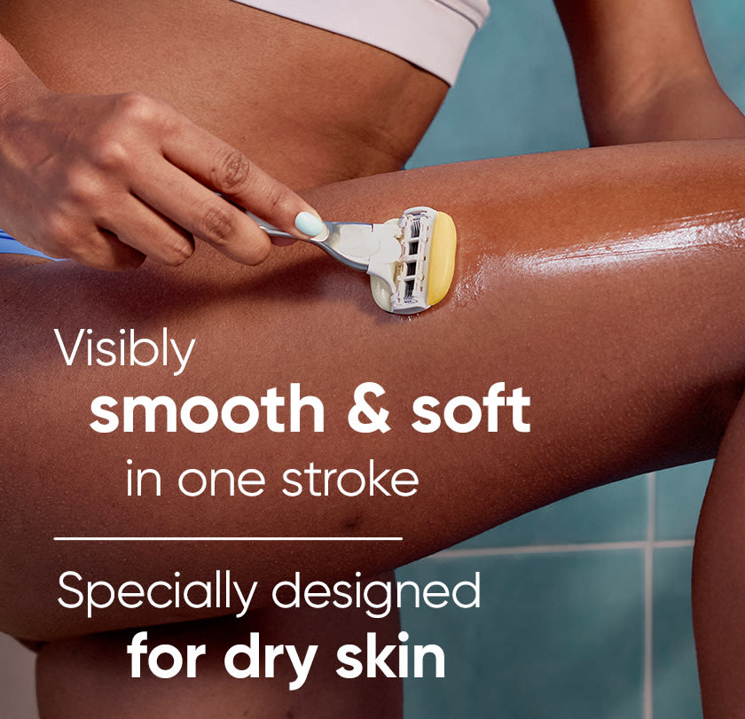 Woman shaving her leg. Visibly smooth and soft in a single stroke. Specially formulated for dry skin.