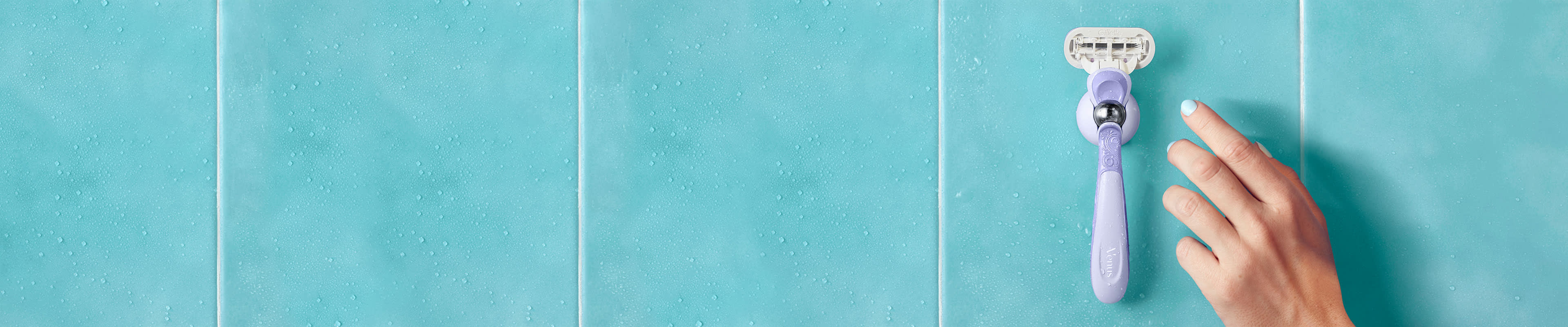 Refillable razor placed on the shower holder in the bathroom