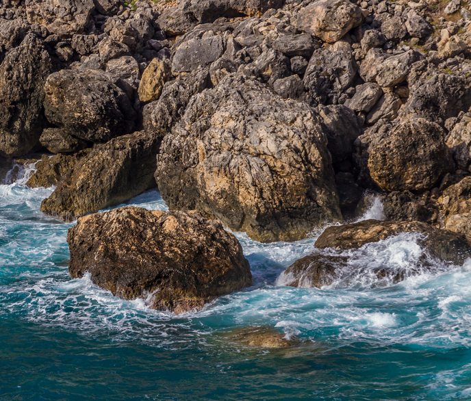 Photo of ocean water on rocks