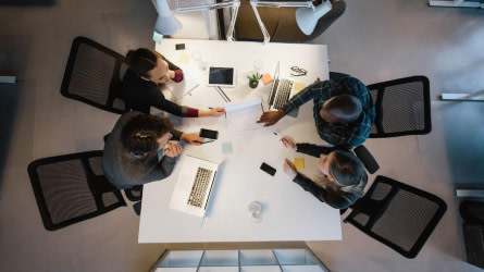 Overhead view of people in a meeting