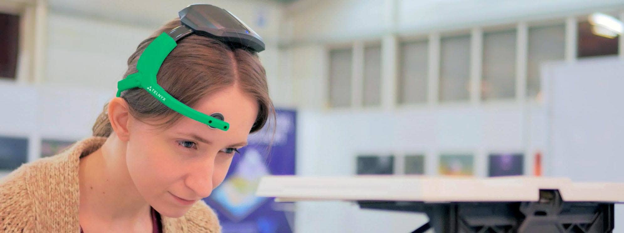 Woman wearing Telnyx Headest