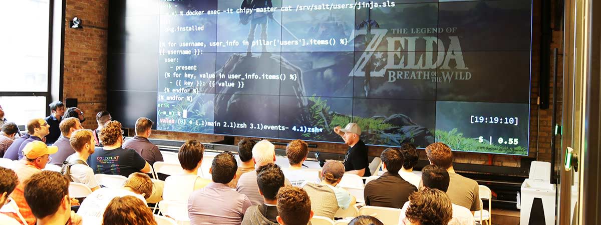 Man giving a presentation on code