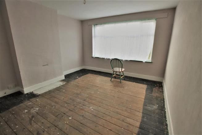 A chair in an empty room