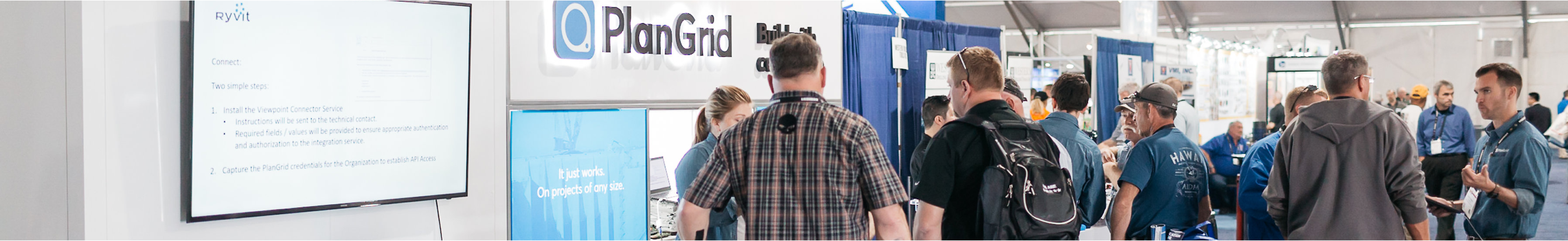 People meeting PlanGrid in-person at an event
