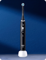 Oral-B iO6 black electric toothbrush featuring round brush head