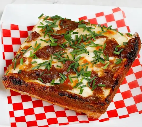 Pizza Squared - caramelized onion slice