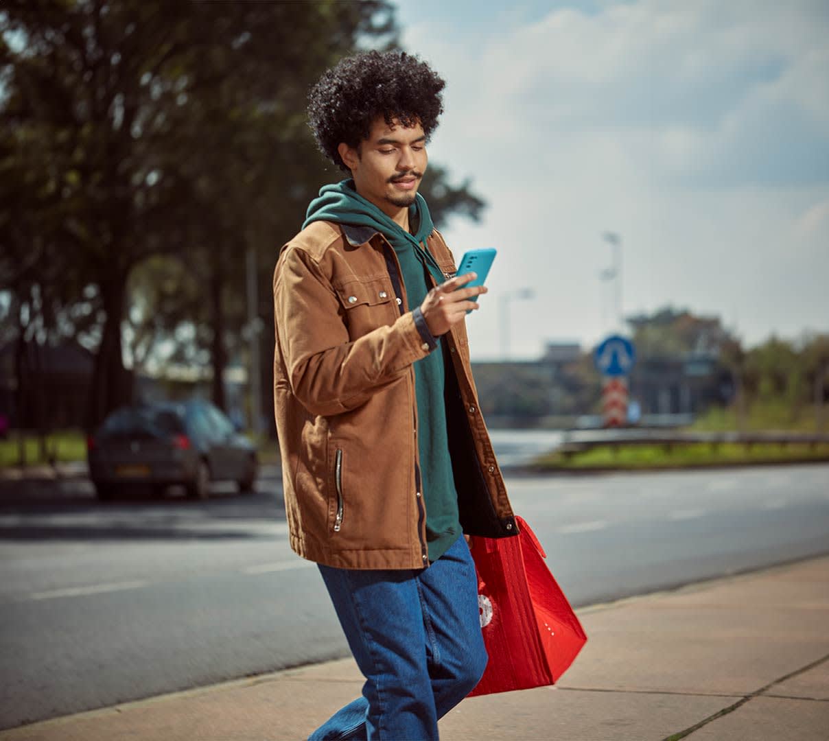 Dx Blog (US/CA/AU/NZ) - 2024 Gig Work Trends: Opportunities Gig Workers Can Look Forward To - Dasher with phone