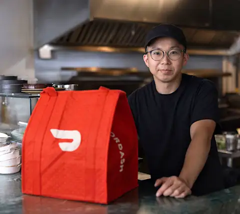 Jonathan Poon of Favorites with DoorDash Bag