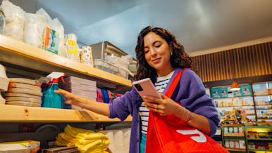 A woman dashing in a convenience store.