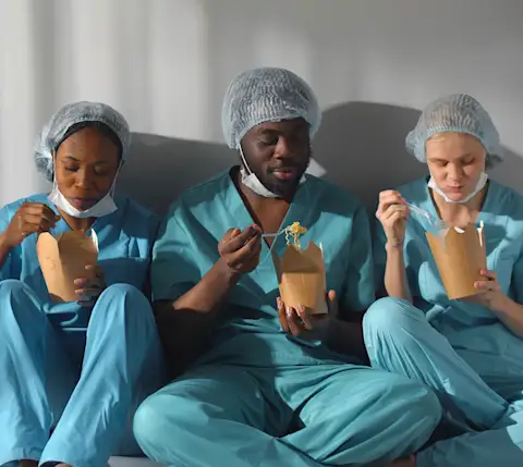 DDfW - Blog - How to Show Employee Appreciation: A Leadership Guide - Medical personnel eating