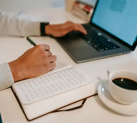 Mx Blog (US/CA/AU/NZ) - How to Write a Restaurant Business Plan: A Step-by-Step Guide - Writing in ledger