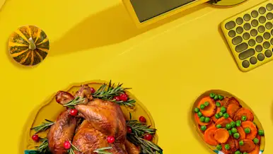 Thanksgiving turkey set beside a computer