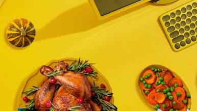 Thanksgiving turkey set beside a computer
