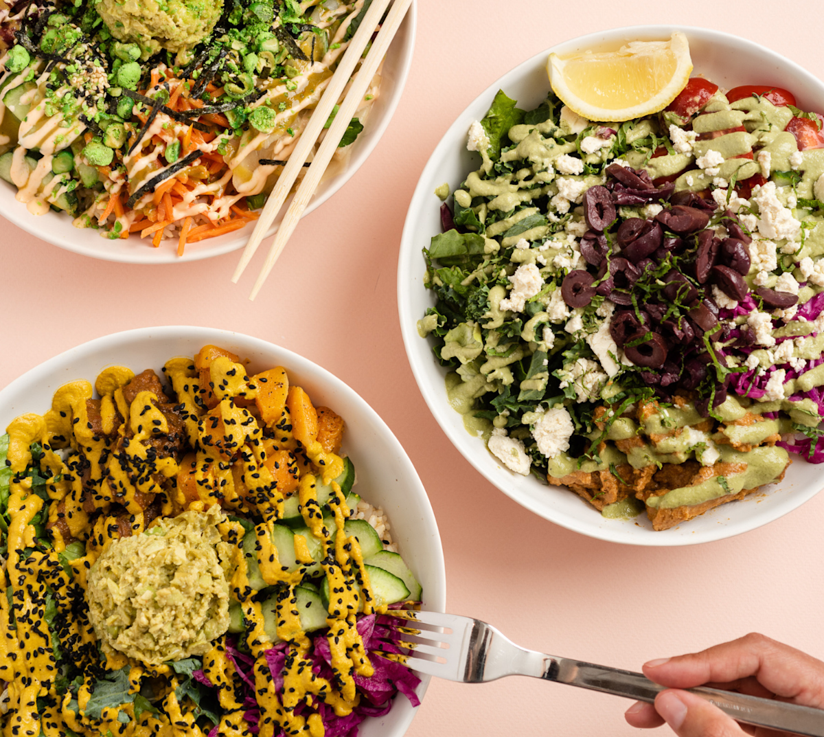 Three of Kokomo's dishes with someone holding a fork