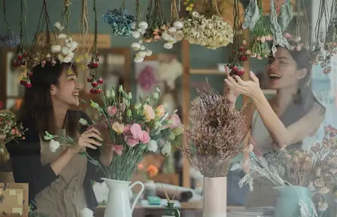 DDfW - Blog - How to Show Employee Appreciation: A Leadership Guide - Employees with plants