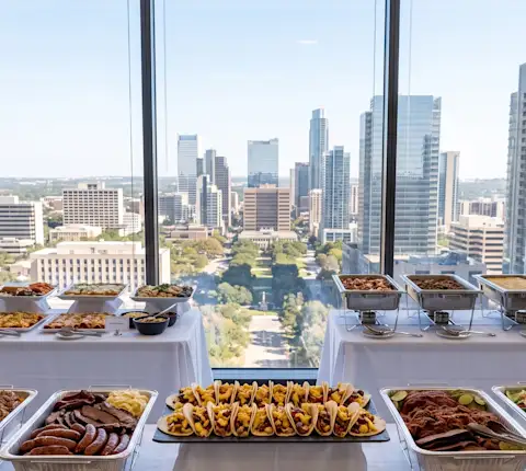 Tex-Mex food, breakfast tacos, bbq served in platters in an office in Austin