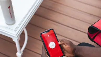 Phone screen displaying DoorDash logo