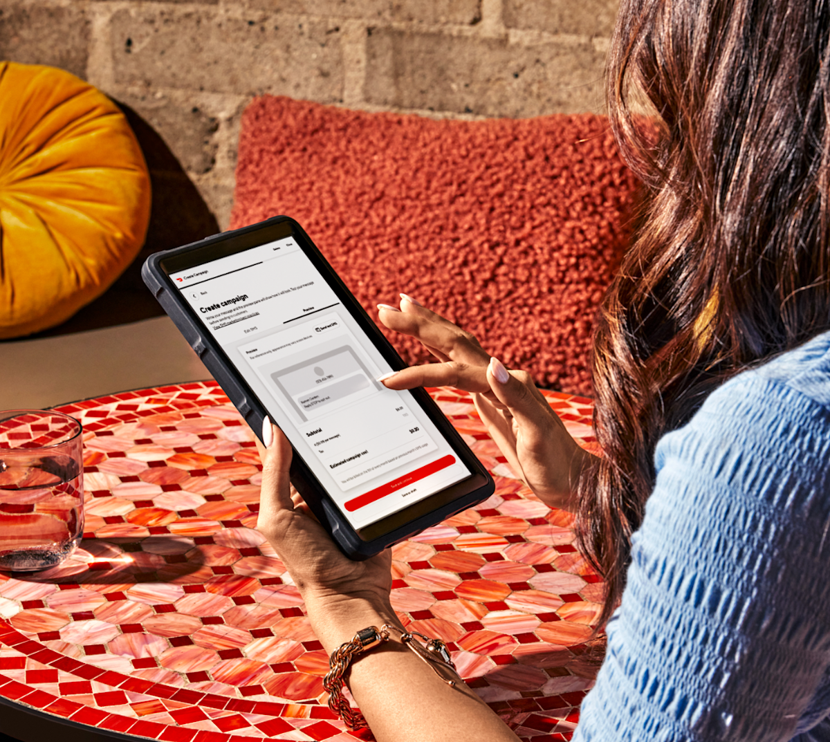 woman with restaurant text marketing tablet