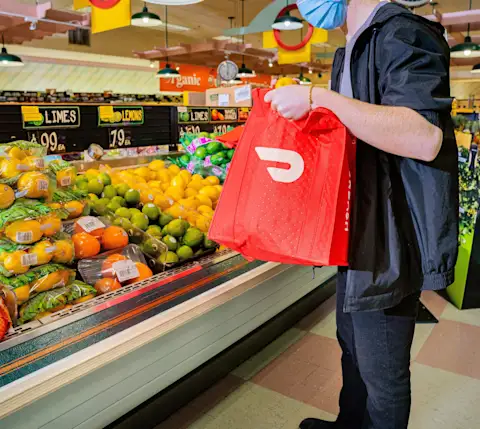 DoorDash shopper in Fishers produce section