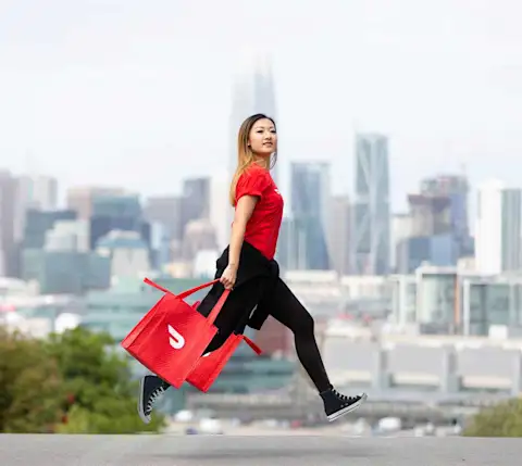 Dasher walking in front of a city skyline