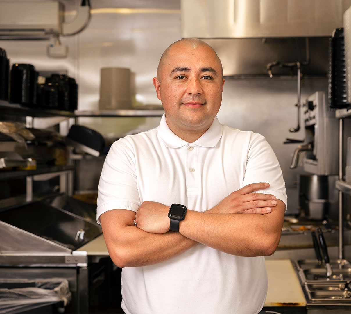 Owner of Senor G's standing in restaurant