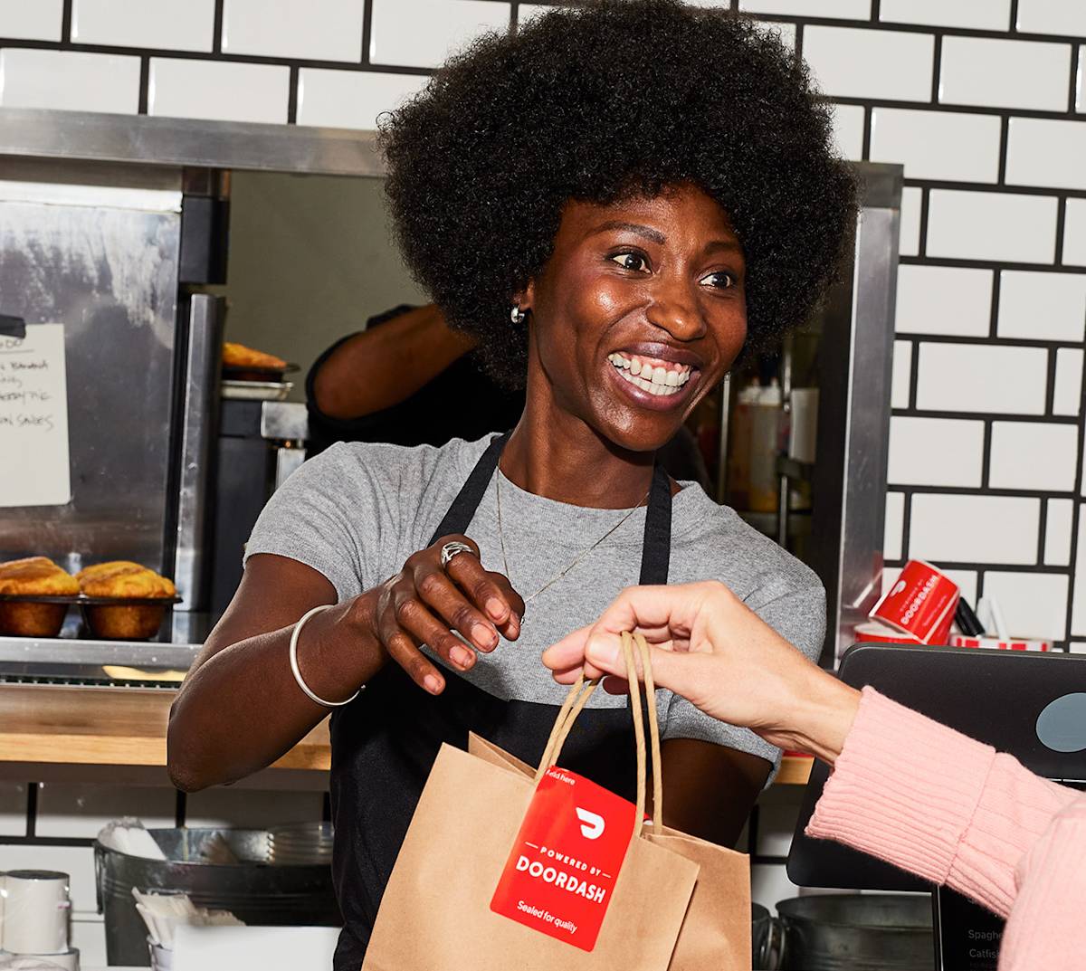 person with DoorDash bag no mask