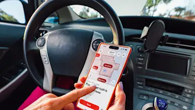 Dx Blog - Dasher Hotspots Hero - Dasher in car navigating map on phone