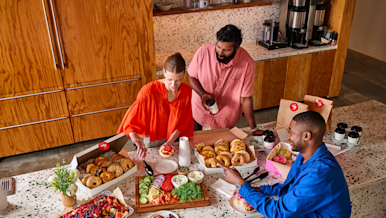 A group of employees having breakfast.