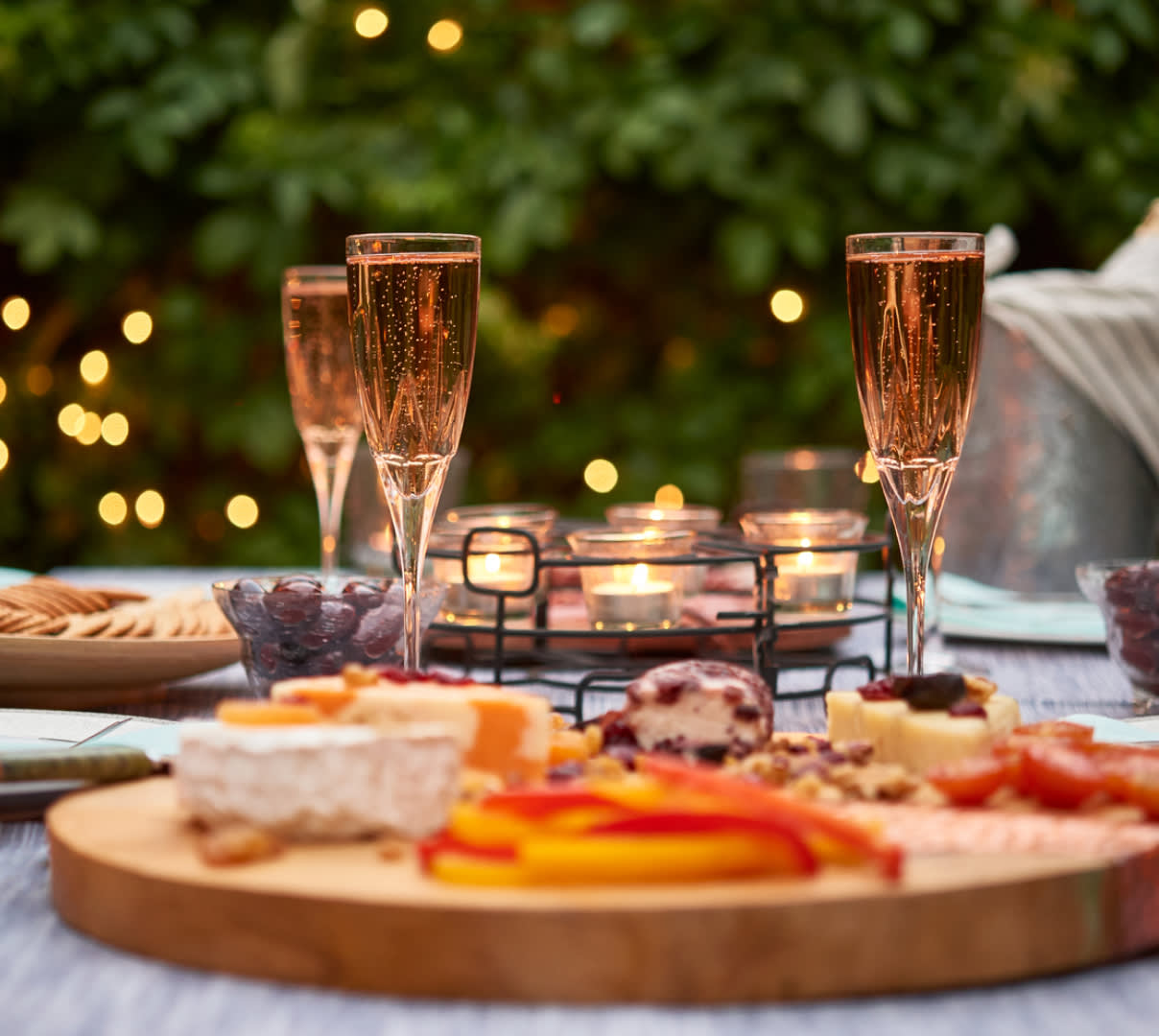 Champagne glasses on an outdoor dining table