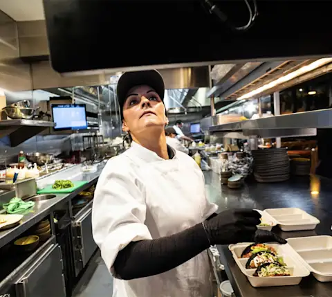 Mx Blog - How Third-Party Delivery Services Work - Chef checking order in kitchen