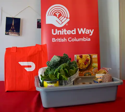 Food Hamper With DoorDash Bag and United Way BC Banner