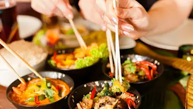 Different plates of Chinese food