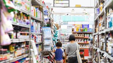 Mother and child shopping in a supermarket