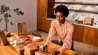 A woman setting the catering for an offsite