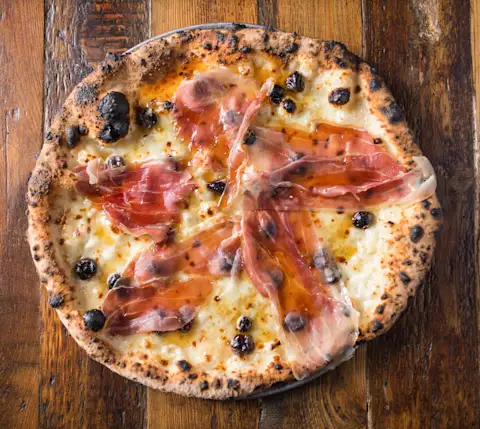 Cherry Jones Pizza (no tomato sauce, cherries, Prosciutto di Parma, honey sauce, blue cheese, pork)