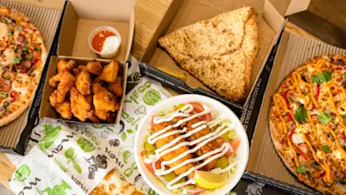 Table of different food items from Manoosh Pizzeria