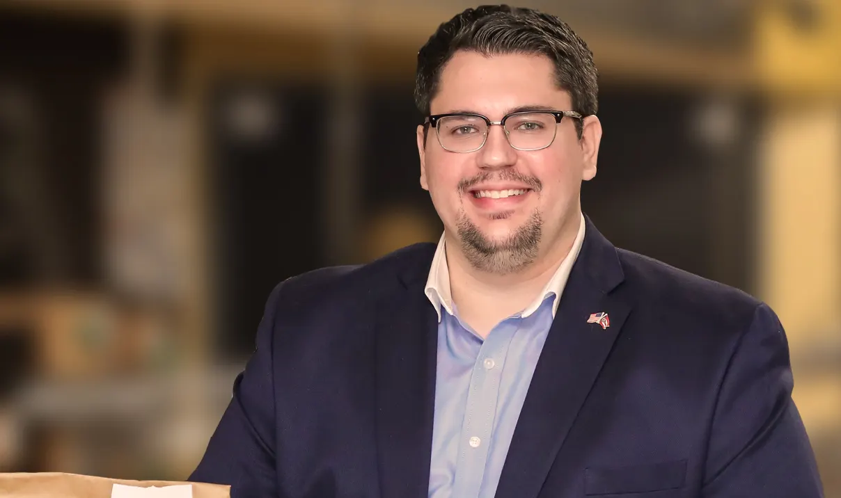 Portrait of restaurateur holding a tablet