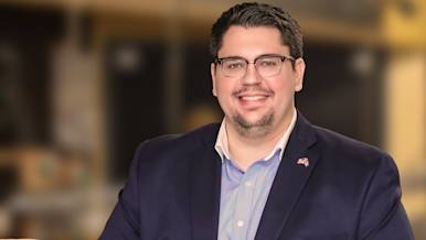 Portrait of restaurateur holding a tablet