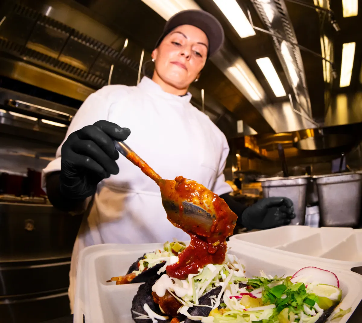 woman-cooking-in-restaurant