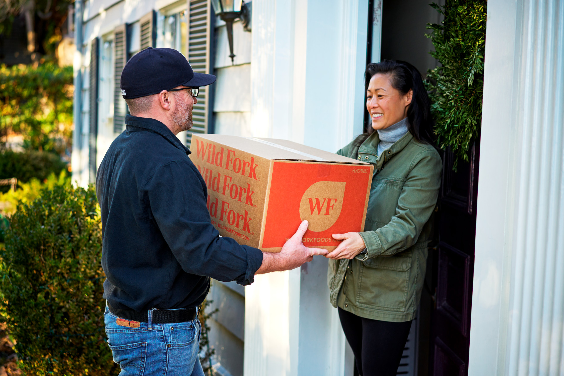 Box Delivery Handoff on Doorstep 1920 px / 1280 px png