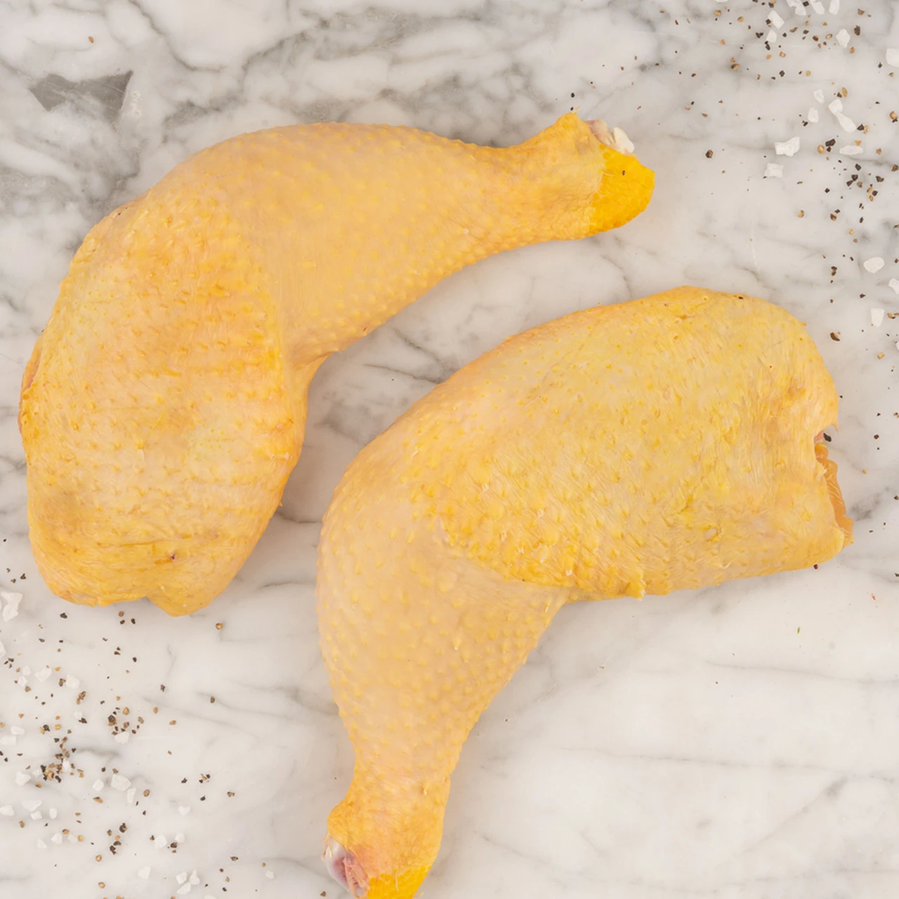 81124-piernas-y-muslos-de-pollo-con-piel-crudo_900x900-1