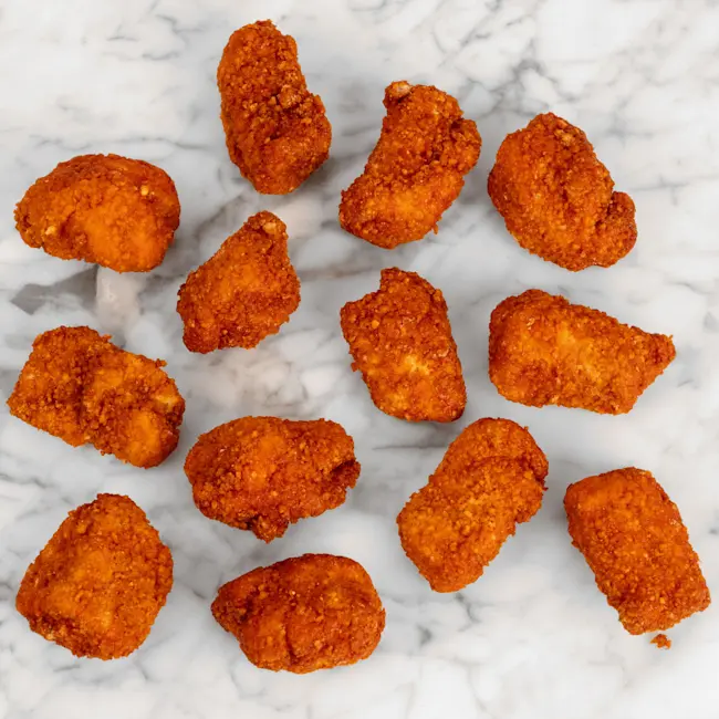 81906_WFMex_Raw_CUBOS DE PECHUGA BUFFALO EMPANIZADOS_Aves