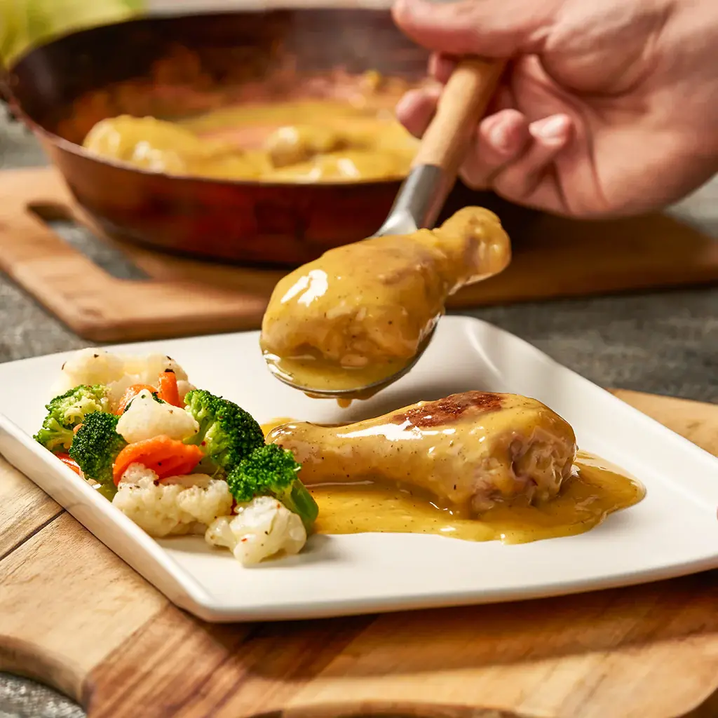 PIERNAS DE POLLO EN SALSA DE NARANJA