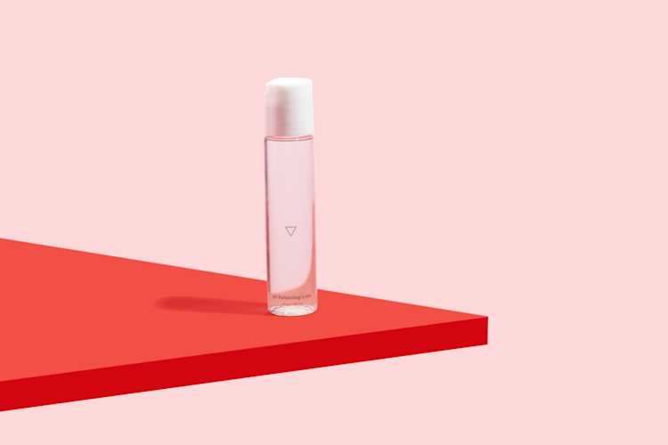 a bottle of harmonizing lube from wisp