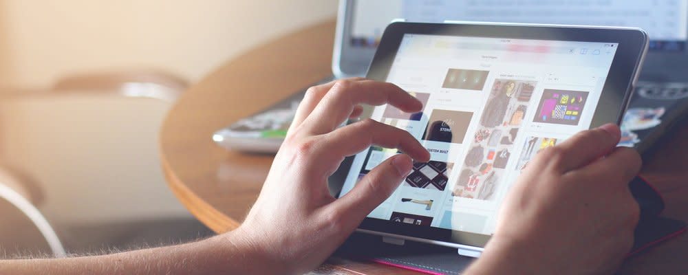 hands-using-tablet