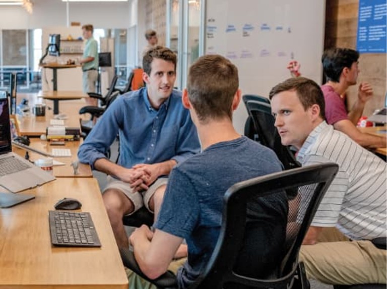 Group of employees collaborating